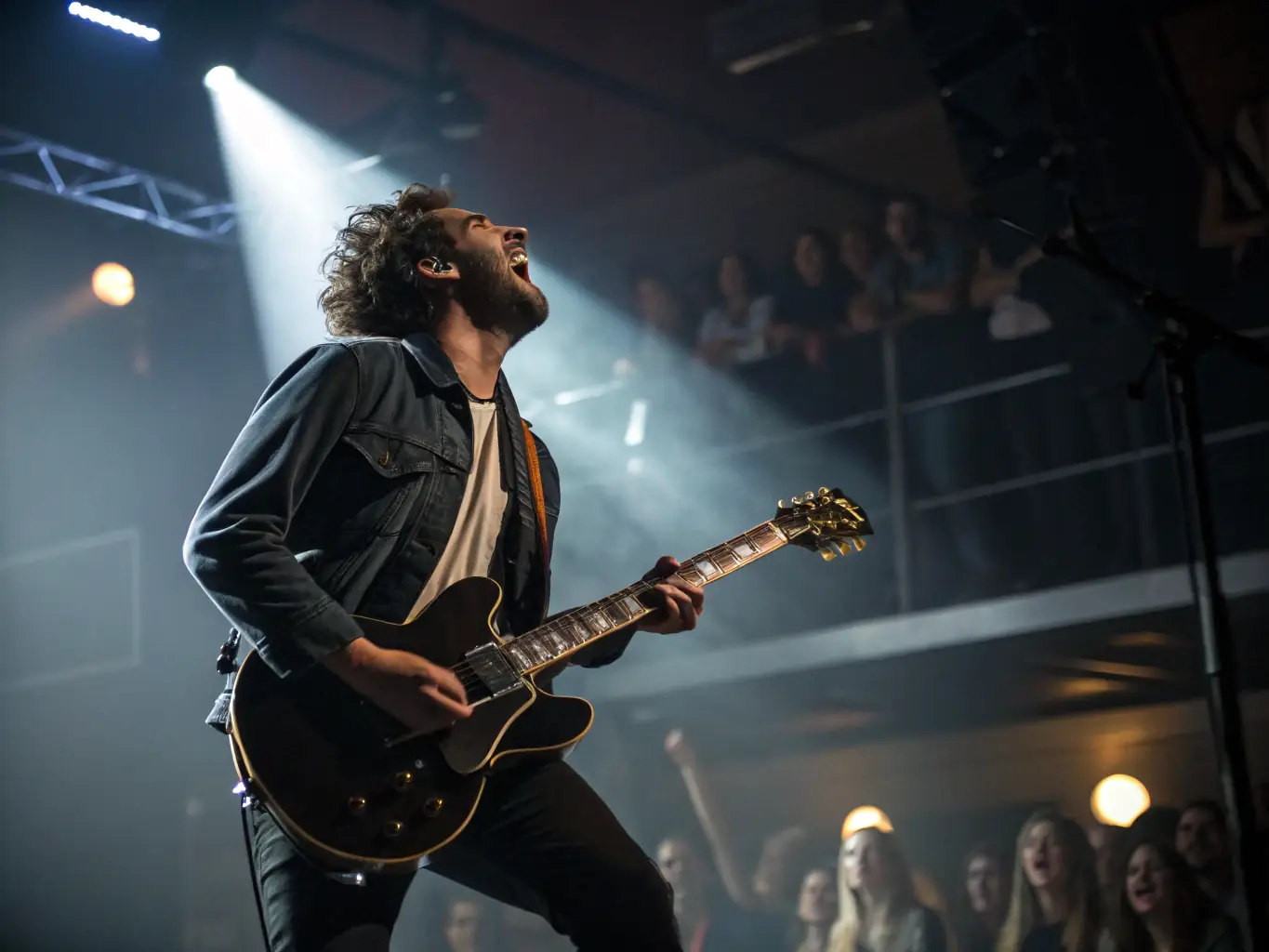 A still from a video recording of a past TORTORE ET DECIBELS event, showing a close-up of a musician passionately playing their instrument. The focus is on the musician's expression and the instrument's details, conveying the intensity of the performance.